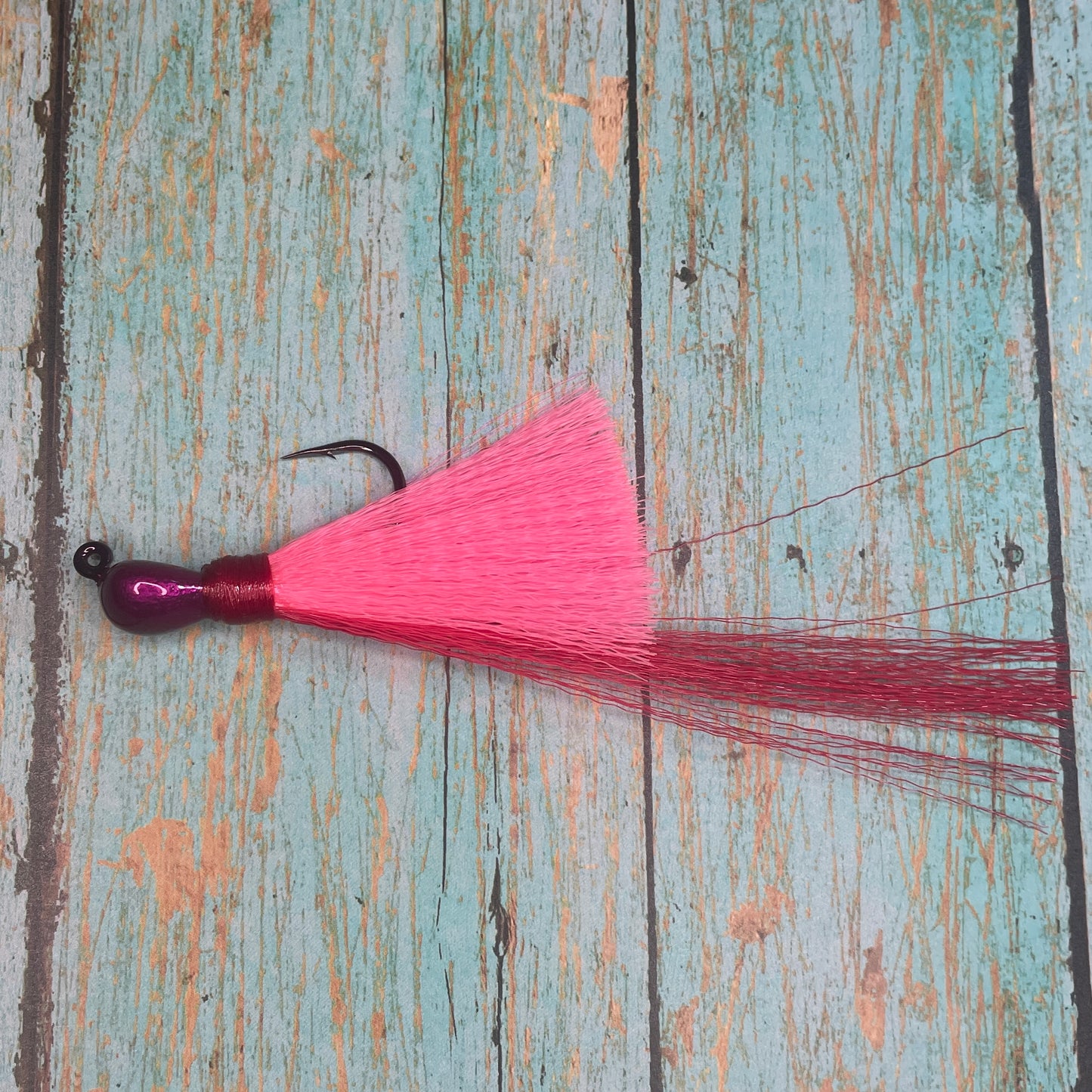 Mini Flare Hawk Jig. Peacock and Snook Candy